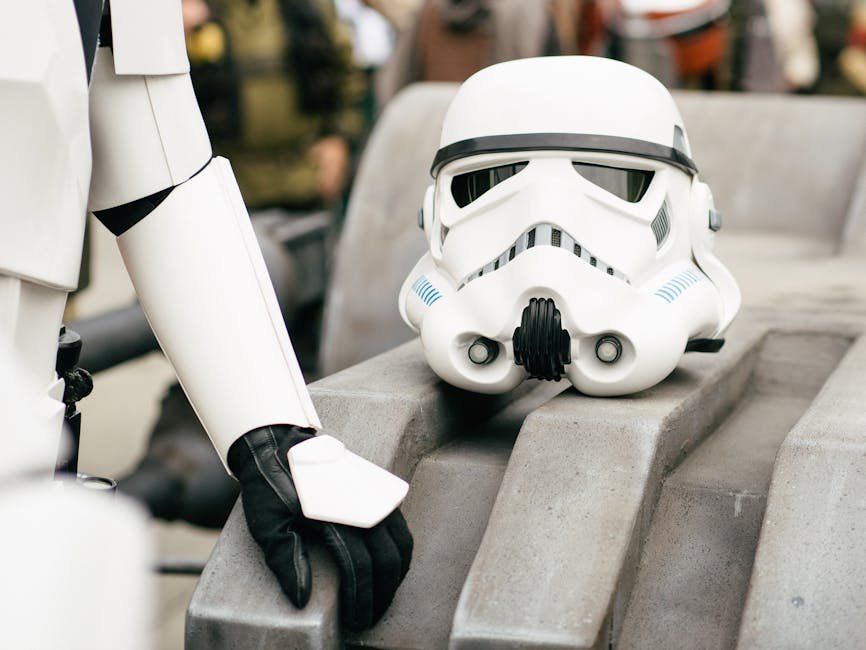 from sci fi salary rise - Detailed shot of a stormtrooper helmet and costume in a cosplay event, showcasing sci-fi culture.